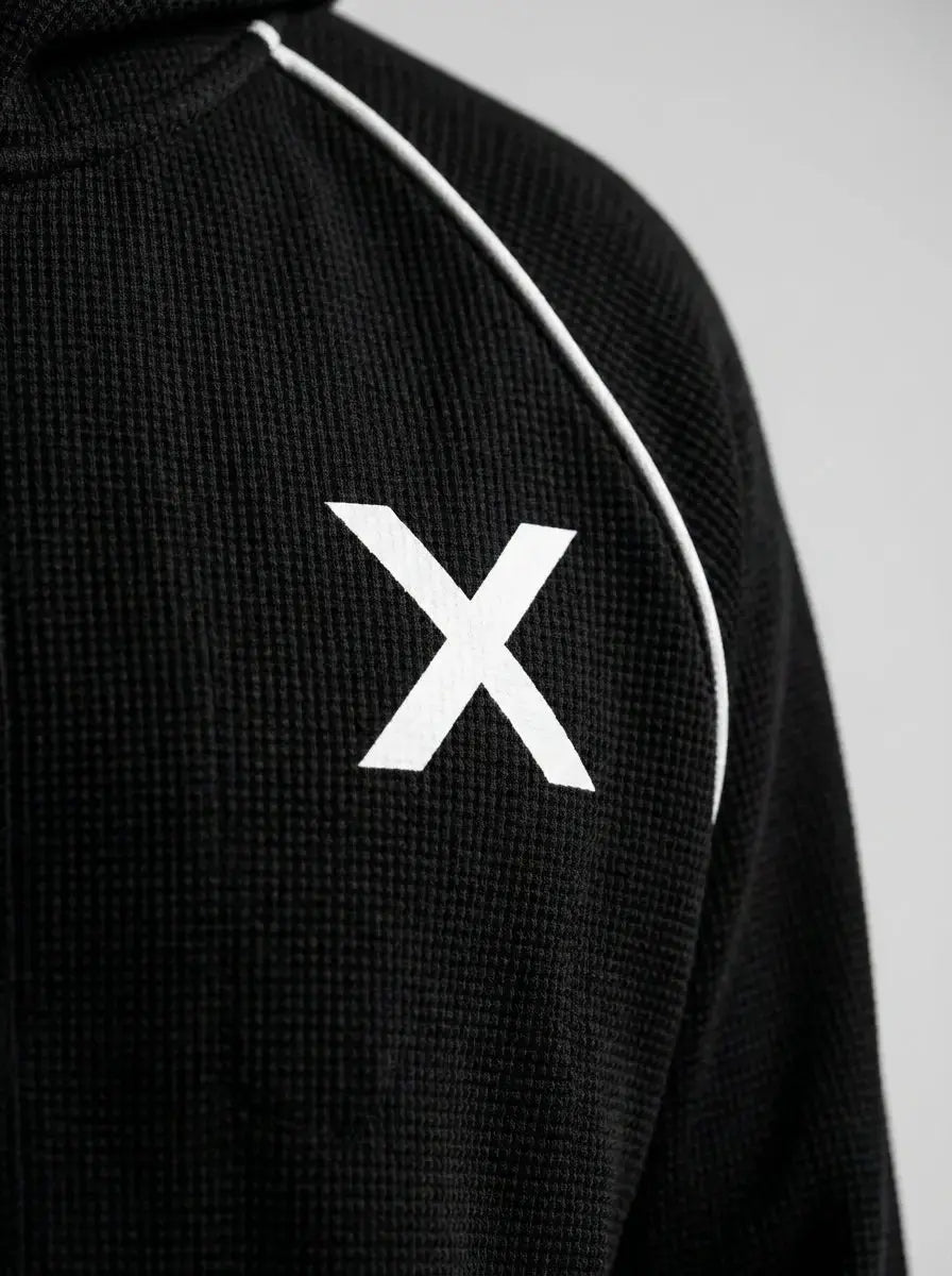 Zip-up waffle-knit hoodie — Fabric and Logo Detail | Generated by Modelize