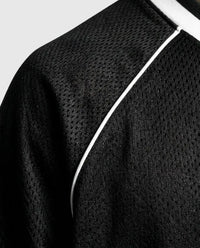 Long-sleeve streetwear jersey — Technical Detail Close-up | Generated by Modelize