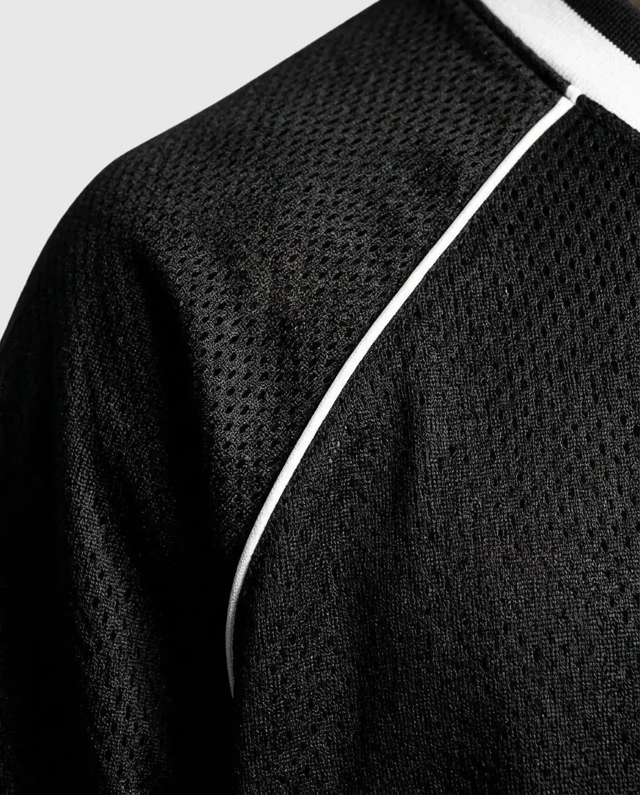 Long-sleeve streetwear jersey — Technical Detail Close-up | Generated by Modelize