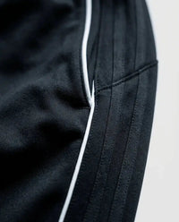 Streetwear joggers — Fabric and Logo Detail | Generated by Modelize
