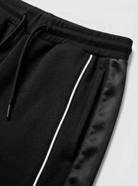 Joggers — Embroidered Crest and Collar Detail | Generated by Modelize