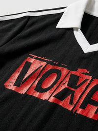 Cropped polo jersey — Fabric and Logo Detail | Generated by Modelize
