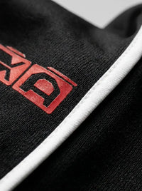 V-neck performance t-shirt — Fabric and Logo Detail | Generated by Modelize