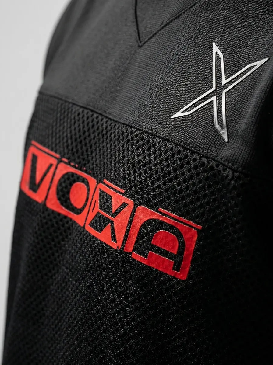 Cropped V-neck performance jersey — Logo and Fabric Detail | Generated by Modelize