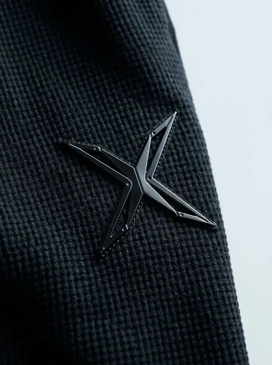 Relaxed-fit barrel trousers — Logo and Fabric Macro | Generated by Modelize