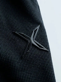 Relaxed-fit barrel trousers — Logo and Fabric Macro | Generated by Modelize