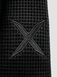 Barrel-cut waffle knit pants — Waffle Texture & Logo Detail | Generated by Modelize