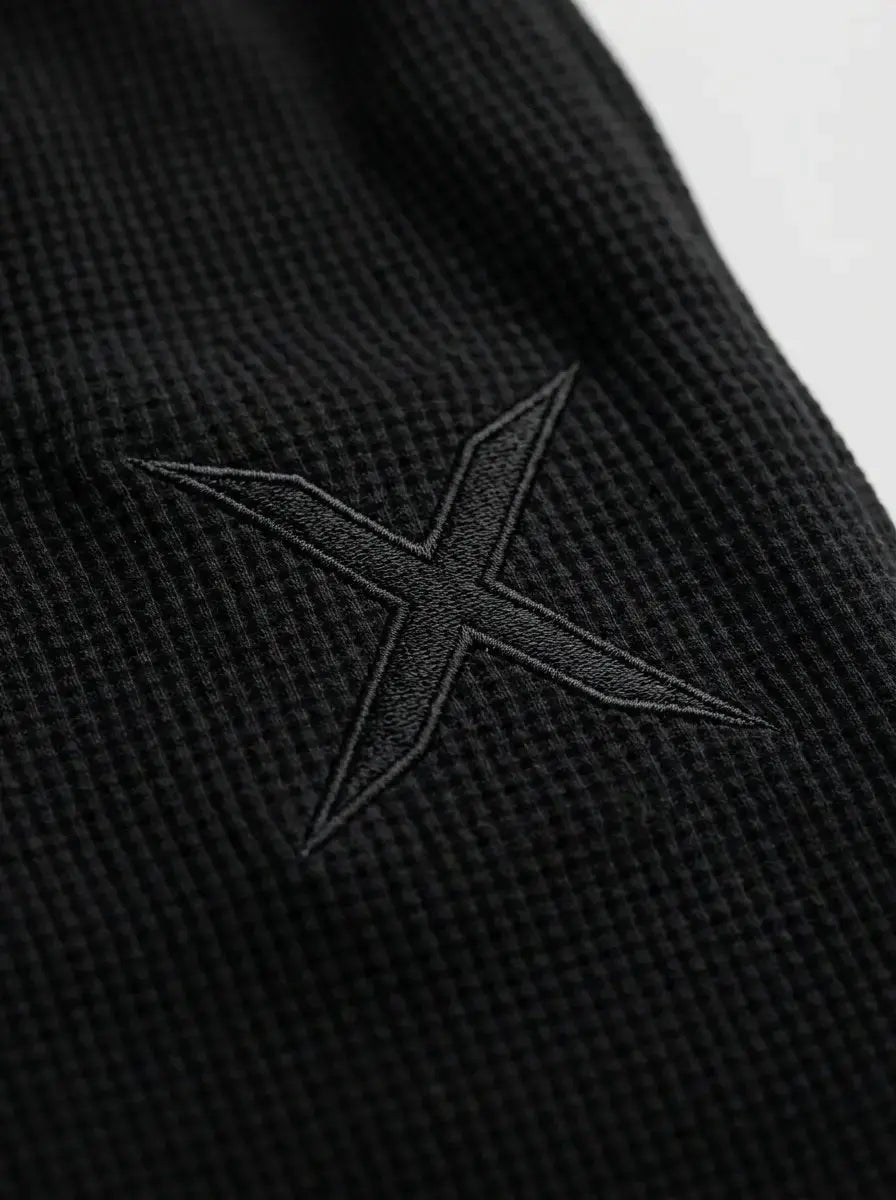 Barrel-leg sweatpants — Embroidered Crest and Collar Detail | Generated by Modelize