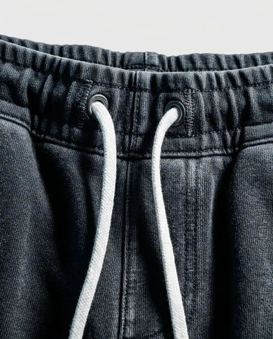 Washed Cotton Streetwear Shorts — Fabric and Logo Detail | Generated by Modelize