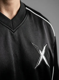 Luxury sportswear t-shirt — Embroidered Crest and Collar Detail | Generated by Modelize