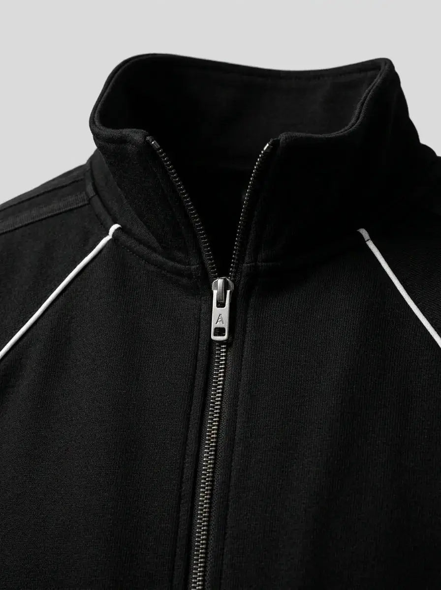 Raglan track jacket — Embroidered Crest and Collar Detail | Generated by Modelize